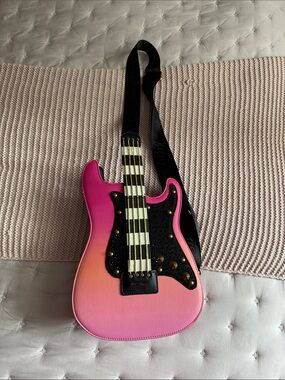 Betsey Johnson’s Pink Gradient Guitar Crossbody Bag